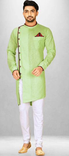 Green color Kurta Pyjamas in Cotton fabric with Thread work