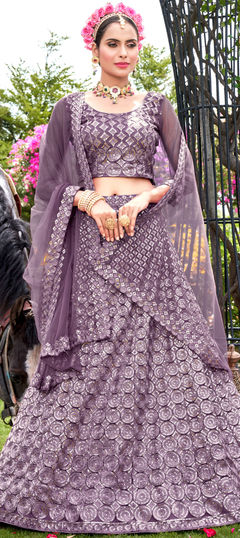 Purple and Violet color Lehenga in Net fabric with Sequence work