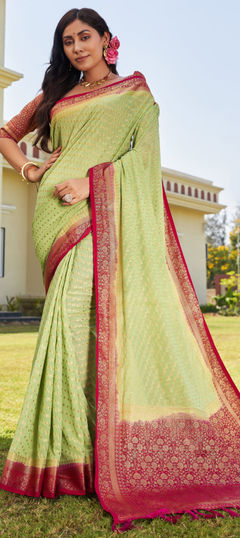 Green color Saree in Georgette fabric with Weaving work