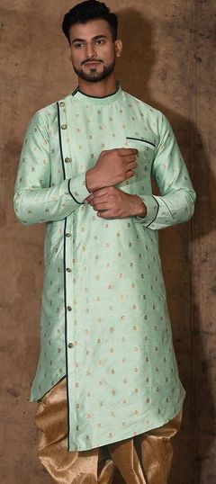 Green color Kurta in Dupion Silk fabric with Weaving work