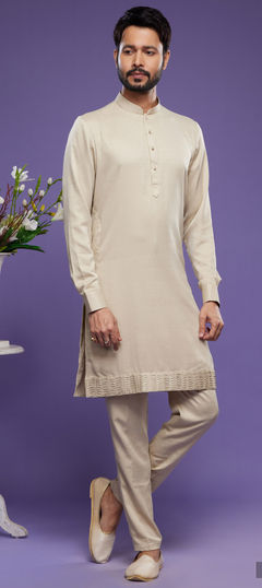 Beige and Brown color Kurta Pyjamas in Art Silk fabric with Thread work