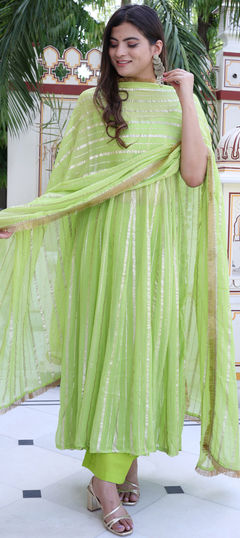 Designer, Festive, Reception Green color Salwar Kameez in Organza Silk fabric with Anarkali Thread work : 1911342