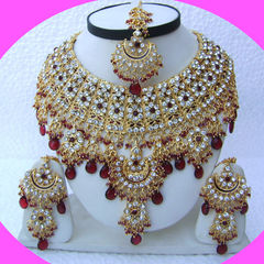 Gold Rodium Polish Red and Maroon color Necklace in Metal Alloy studded with CZ Diamond, Kundan