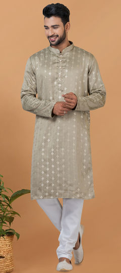 Green color Kurta Pyjamas in Art Silk fabric with Embroidered, Sequence work