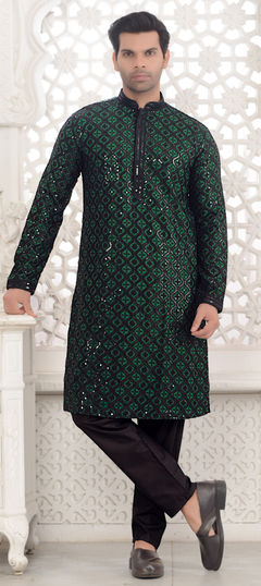 Green color Kurta Pyjamas in Rayon fabric with Sequence work