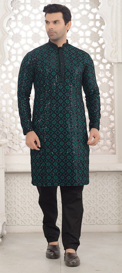 Blue color Kurta Pyjamas in Rayon fabric with Sequence work