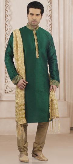 Green color Kurta Pyjamas in Dupion Silk fabric with Embroidered, Thread work