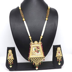 Gold Rodium Polish Green, Red and Maroon color Necklace in Brass studded with Kundan