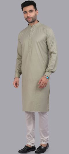 Green color Kurta Pyjamas in Art Silk fabric with Thread work