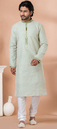 Green color Kurta Pyjamas in Silk fabric with Thread work