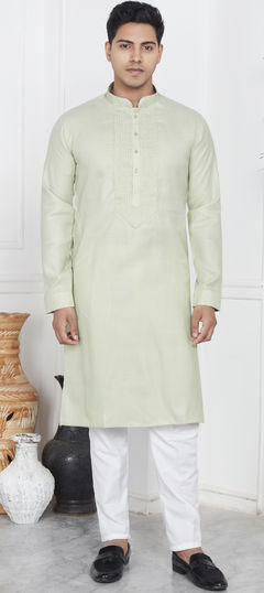 Green color Kurta Pyjamas in Cotton fabric with Thread work