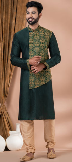 Green color Kurta Pyjamas in Dupion Silk fabric with Weaving work