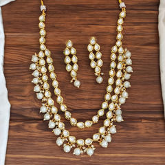 Gold Rodium Polish White and Off White color Necklace in Metal Alloy studded with Pearl