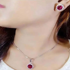 Gold Rodium Polish Red and Maroon color Pendant in Metal Alloy studded with CZ Diamond