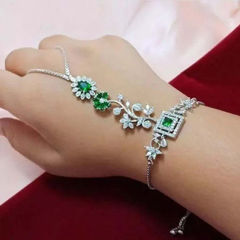 Gold Rodium Polish Green color Bracelet in Metal Alloy studded with CZ Diamond