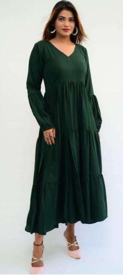 Green color Gown in Silk fabric with Thread work