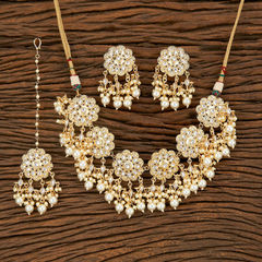 Gold Rodium Polish Gold, White and Off White color Necklace in Brass studded with Pearl