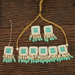 Gold Rodium Polish Gold, White and Off White color Necklace in Brass studded with Pearl