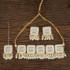 Gold Rodium Polish Gold, White and Off White color Necklace in Brass studded with Pearl