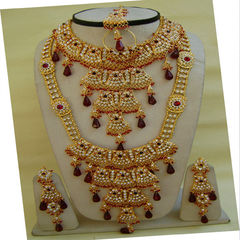 Gold Rodium Polish Red and Maroon color Bridal Jewelry in Metal Alloy studded with Cubic Zirconia, Kundan