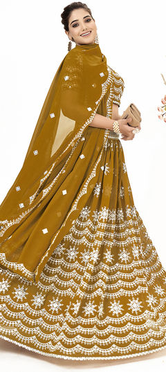 Yellow color Lehenga in Georgette fabric with Fancy Work work