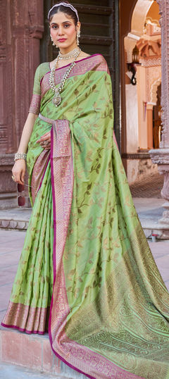 Green color Saree in Silk cotton fabric with Weaving work