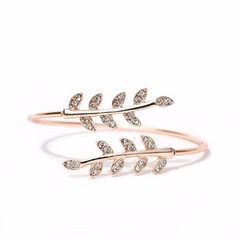 Gold Rodium Polish White and Off White color Bracelet in Metal Alloy studded with Artificial