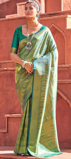 Green color Saree in Blended fabric with Weaving work