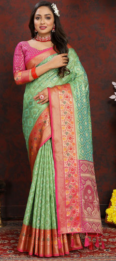 Green color Saree in Organza Silk fabric with Weaving work