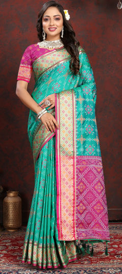 Green color Saree in Patola Silk fabric with Weaving, Zari work