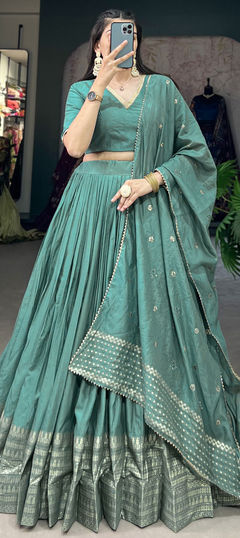 Green color Lehenga in Chanderi Silk fabric with Weaving, Zari work