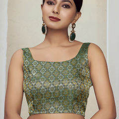 Green color Blouse in Banarasi Silk fabric with Weaving work