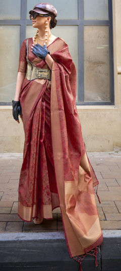 Orange color Saree in Organza Silk fabric with Weaving work