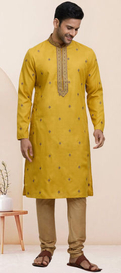 Yellow color Kurta Pyjamas in Art Silk fabric with Embroidered work