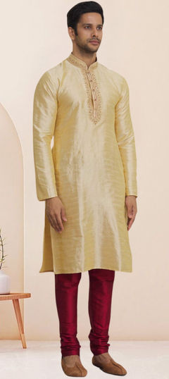 Gold color Kurta Pyjamas in Art Silk fabric with Embroidered work