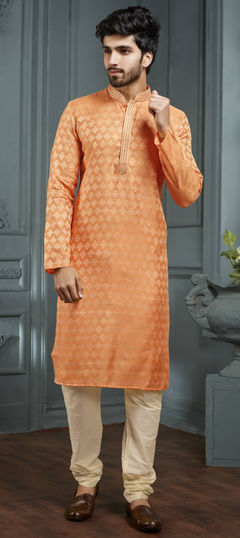 Orange color Kurta Pyjamas in Jacquard fabric with Weaving work