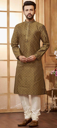 Gold color Kurta Pyjamas in Jacquard fabric with Weaving work