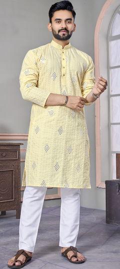 Yellow color Kurta Pyjamas in Linen fabric with Embroidered, Resham, Thread work