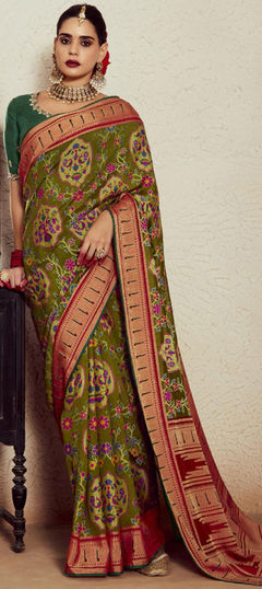 Green color Saree in Art Silk fabric with Bandhej, Weaving work