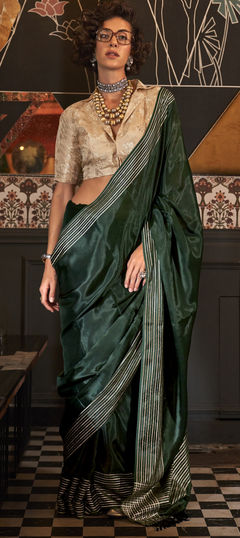 Green color Saree in Viscose fabric with Weaving work