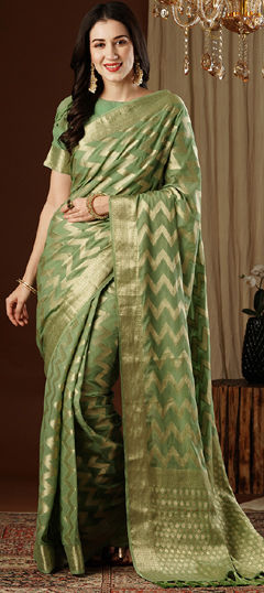 Green color Saree in Georgette fabric with Weaving work