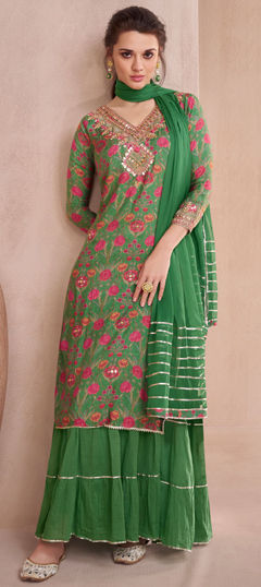 Green color Gown in Muslin fabric with Embroidered, Printed, Sequence, Thread work