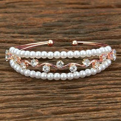 Gold Rodium Polish White and Off White color Bracelet in Brass studded with CZ Diamond
