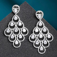 Silver Rodium Polish White and Off White color Earrings in Brass studded with CZ Diamond