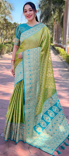 Green color Saree in Tissue fabric with Weaving, Zari work