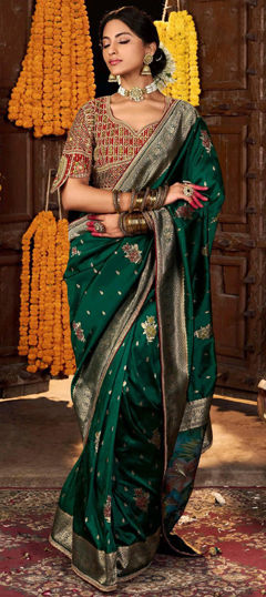 Green color Saree in Silk fabric with Thread, Weaving, Zari work