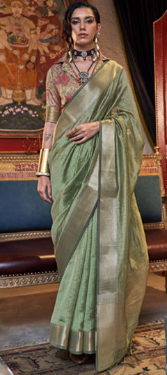 Green color Saree in Chiffon fabric with Weaving work