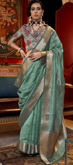 Green color Saree in Chiffon fabric with Weaving work