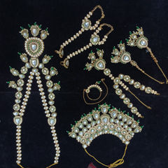 Green color Bridal Jewelry in Metal Alloy studded with CZ Diamond, Kundan, Pearl & Gold Rodium Polish : 1973089