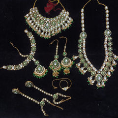 Green color Bridal Jewelry in Metal Alloy studded with CZ Diamond, Kundan, Pearl & Gold Rodium Polish : 1973094